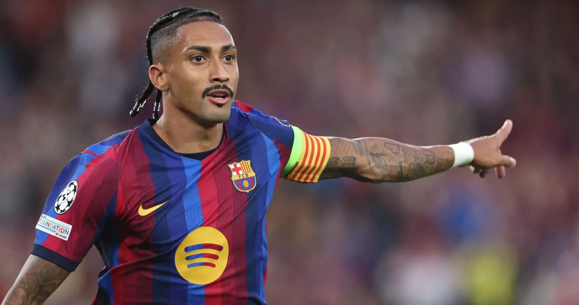 Player gesturing during a match at Camp Nou