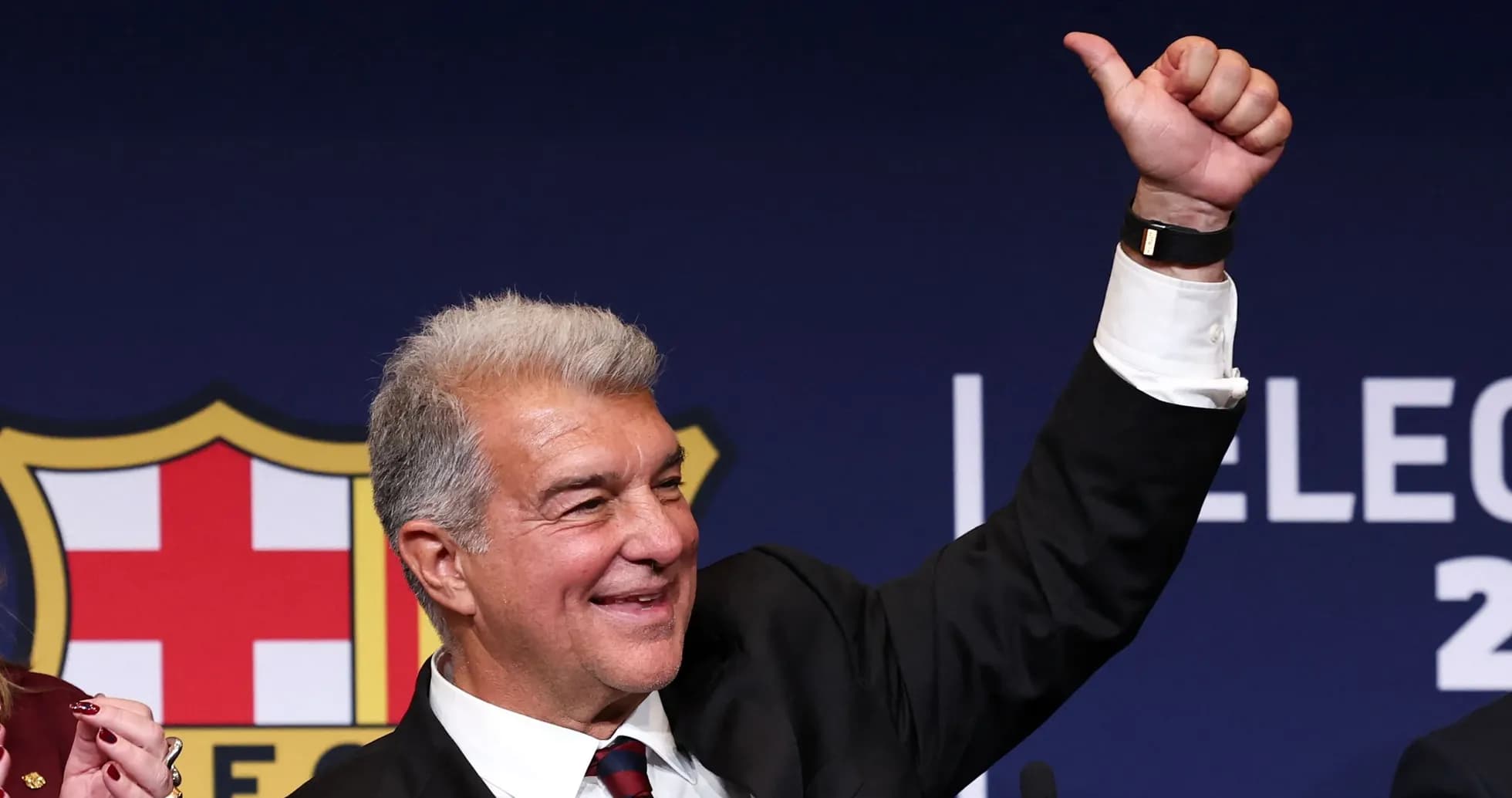 Man celebrating victory at FC Barcelona election event