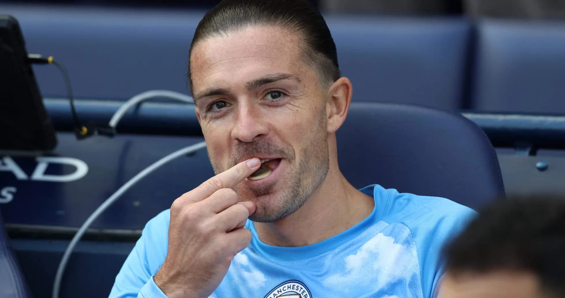 Player eating snack on the bench during match
