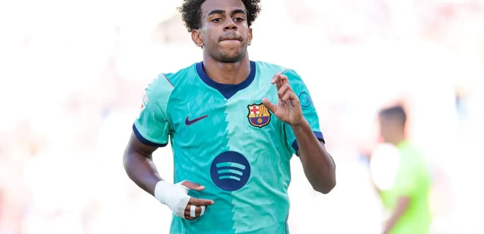 Player in Barcelona kit celebrating during match