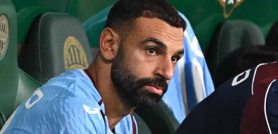 Player sitting on the bench during match