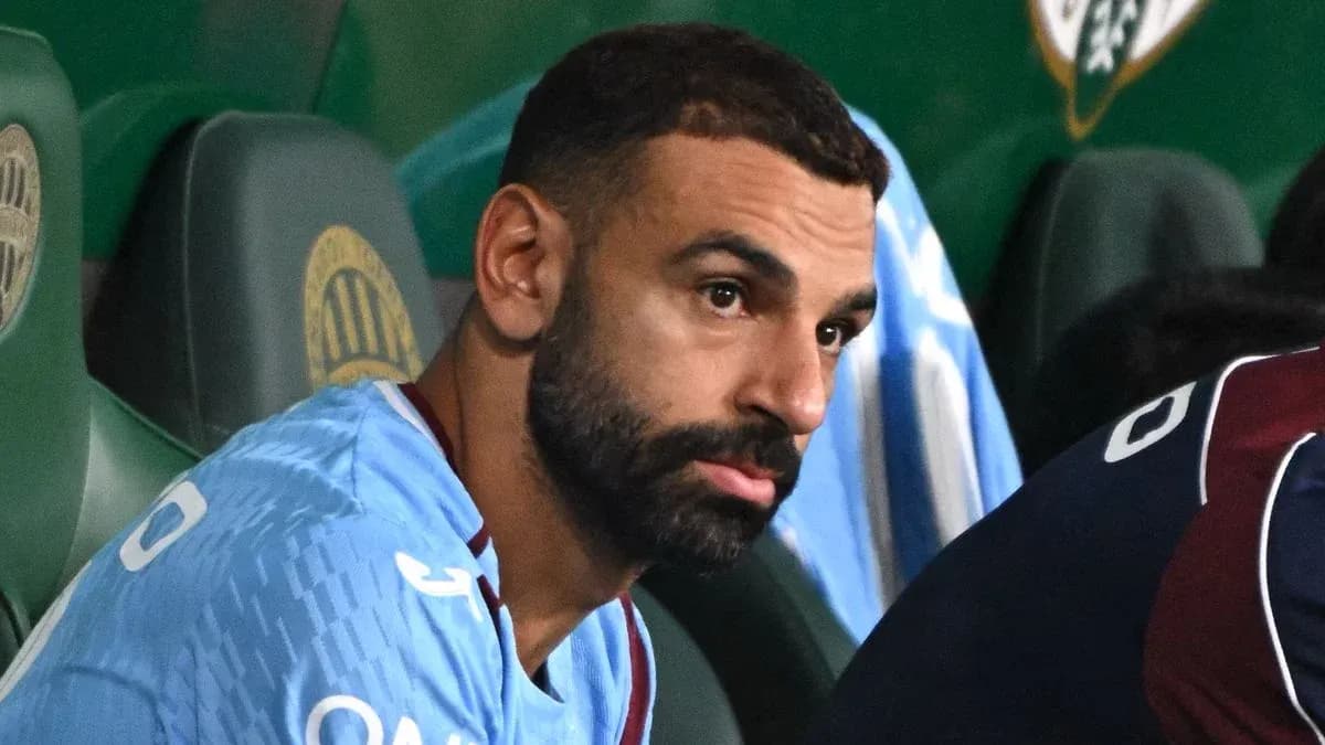 Player sitting on the bench during match