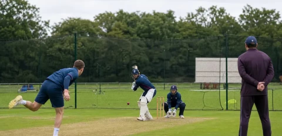 Batsman facing bowler during cricket practice session