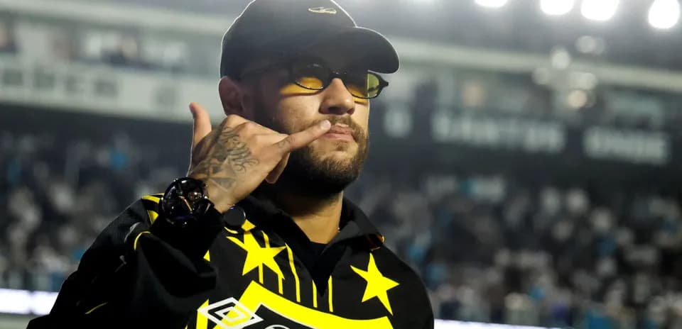 Man in cap and glasses making hand gesture