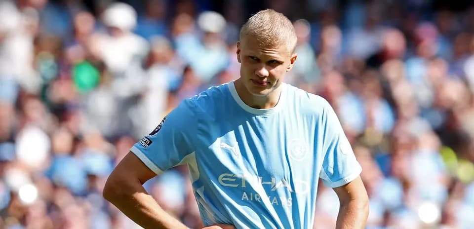 Player in light blue jersey during match action