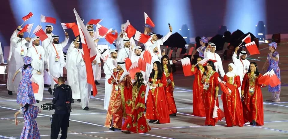 Bahrain team parading with flags at ceremony
