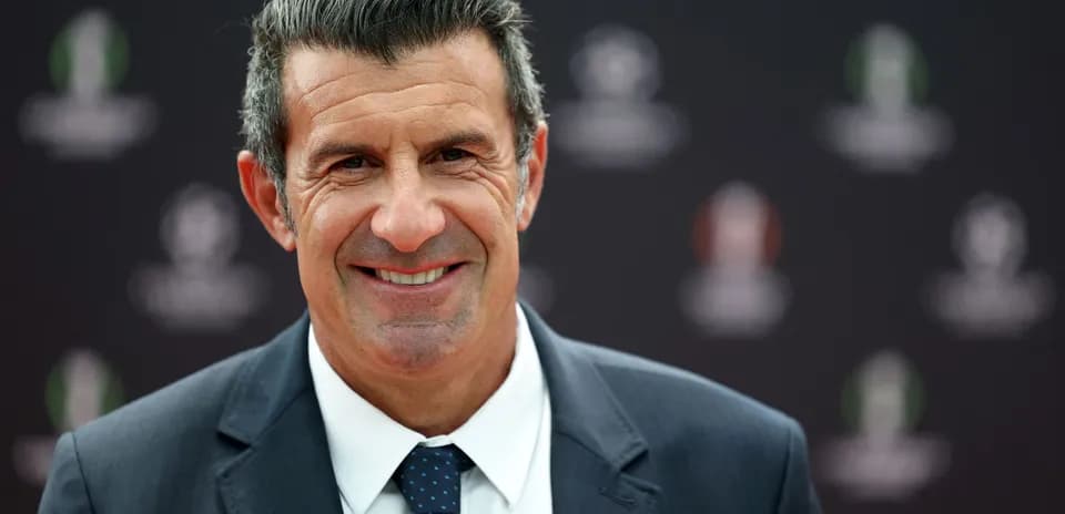 Smiling man in a suit at an event