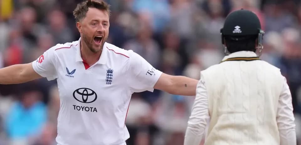 Bowler celebrating wicket against opposing batsman