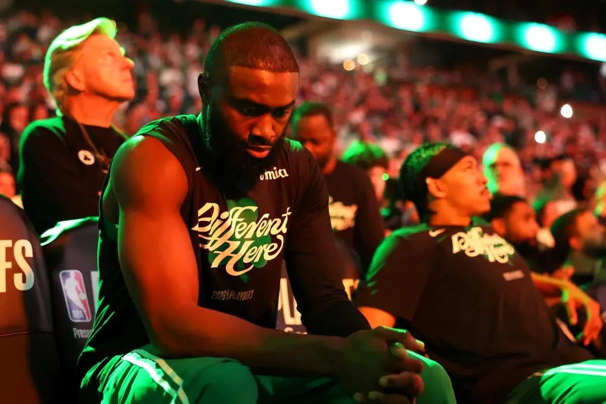 Players sitting on bench during playoff game introduction