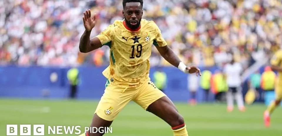 Player in yellow kit during football match action
