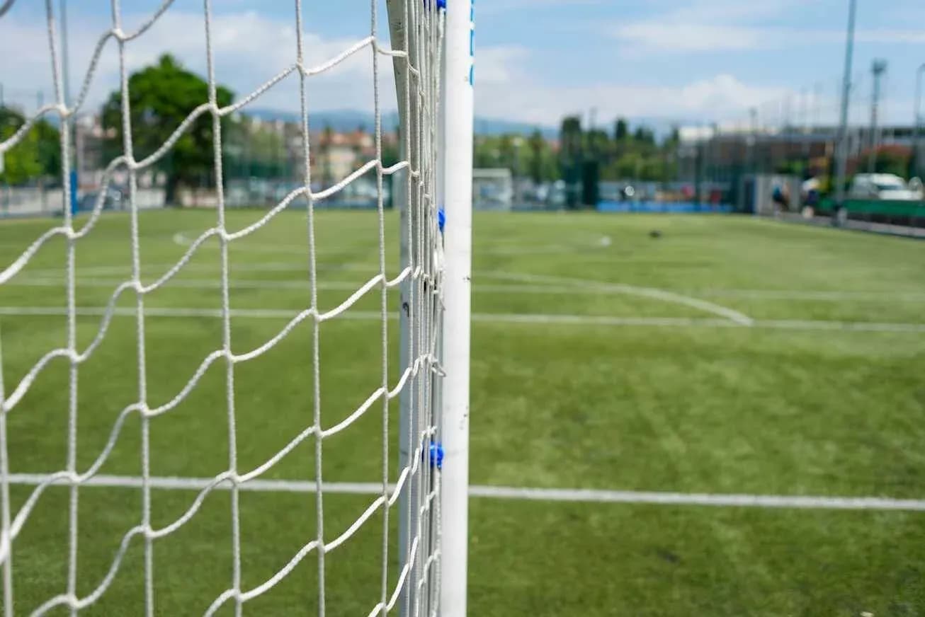 Soccer goal with net on grassy field