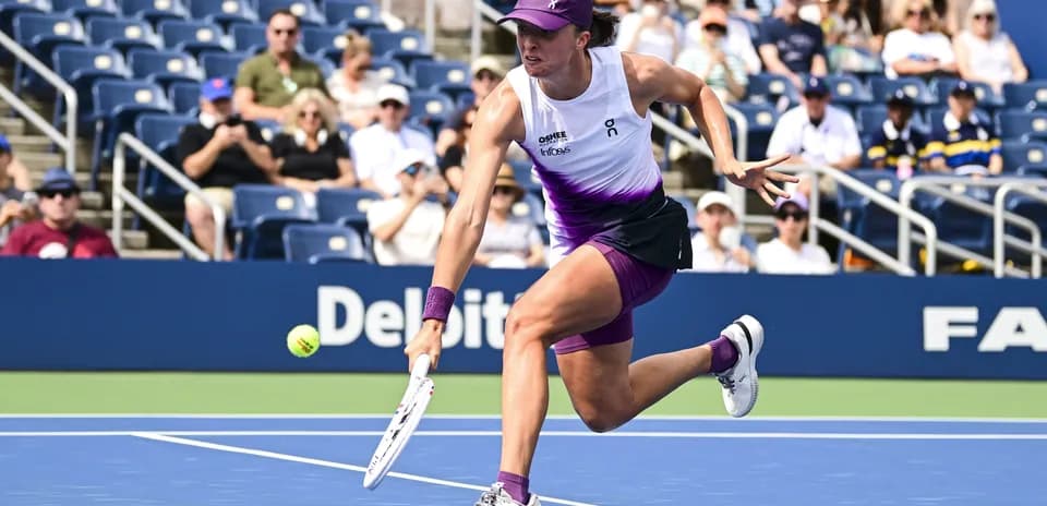 Player executing a forehand during tennis match