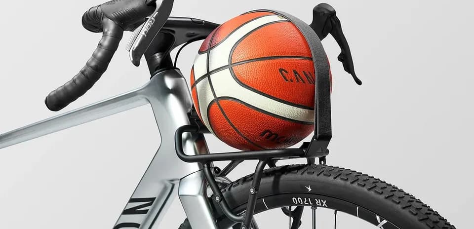 Basketball secured on a bicycle's rear rack