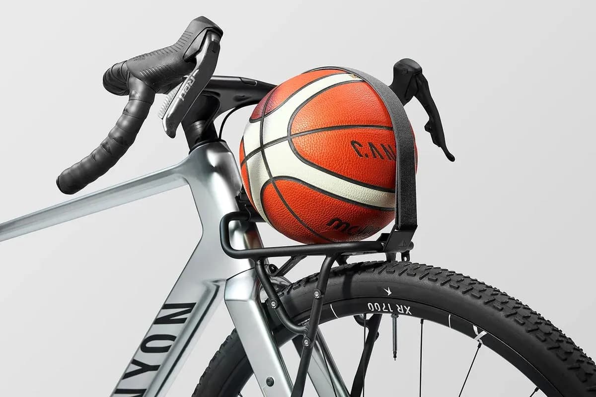 Basketball secured on a bicycle's rear rack