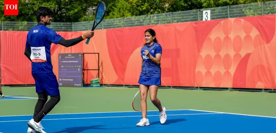 Players celebrating on a tennis court after a match