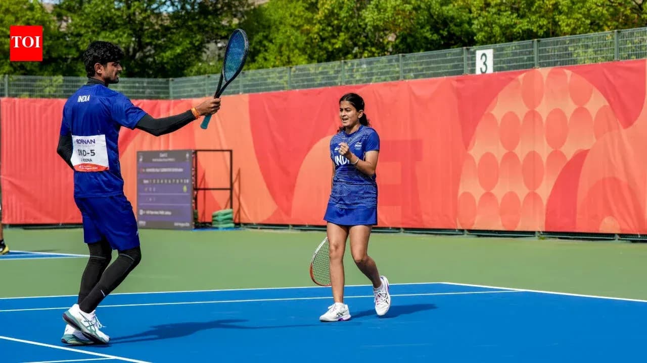 Players celebrating on a tennis court after a match