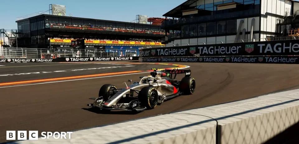 Formula 1 car navigating a turn on the track