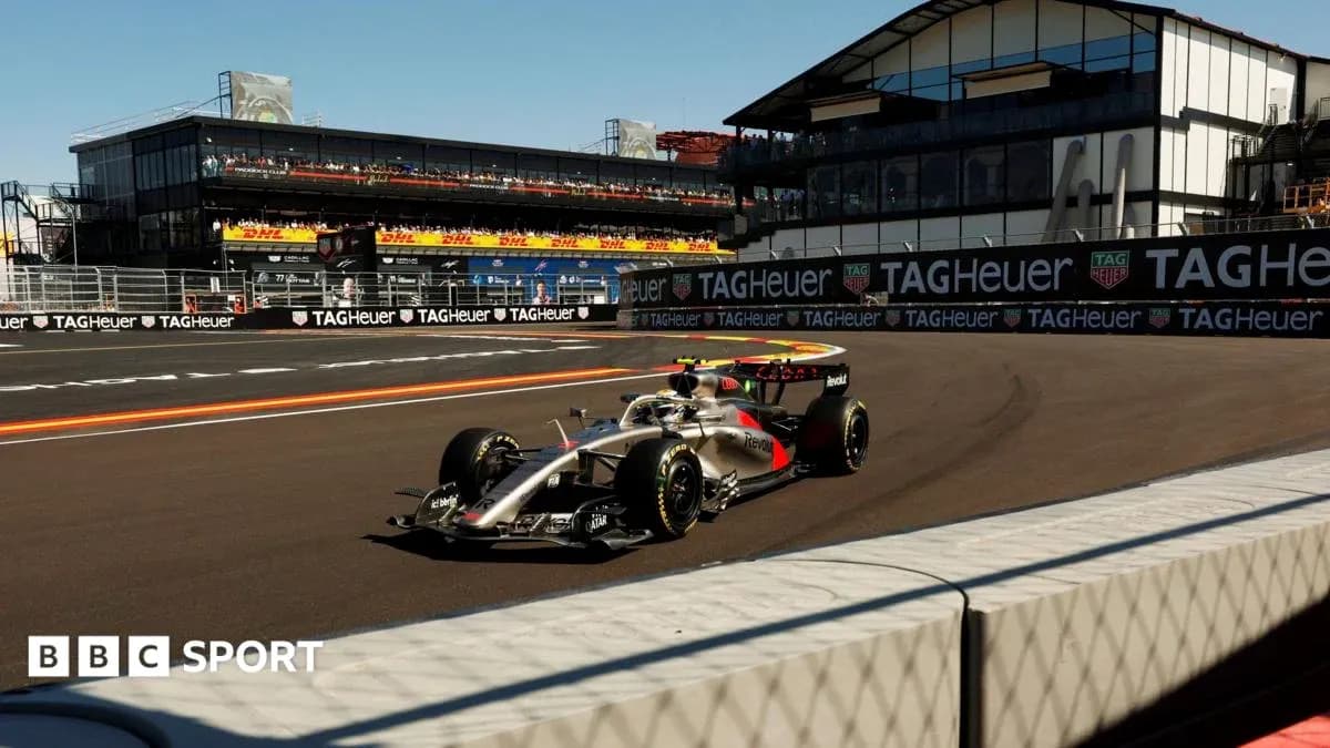 Formula 1 car navigating a turn on the track