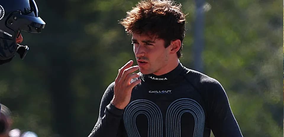 Driver discussing strategy during racing practice session