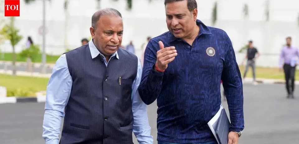 Two men walking and conversing outdoors