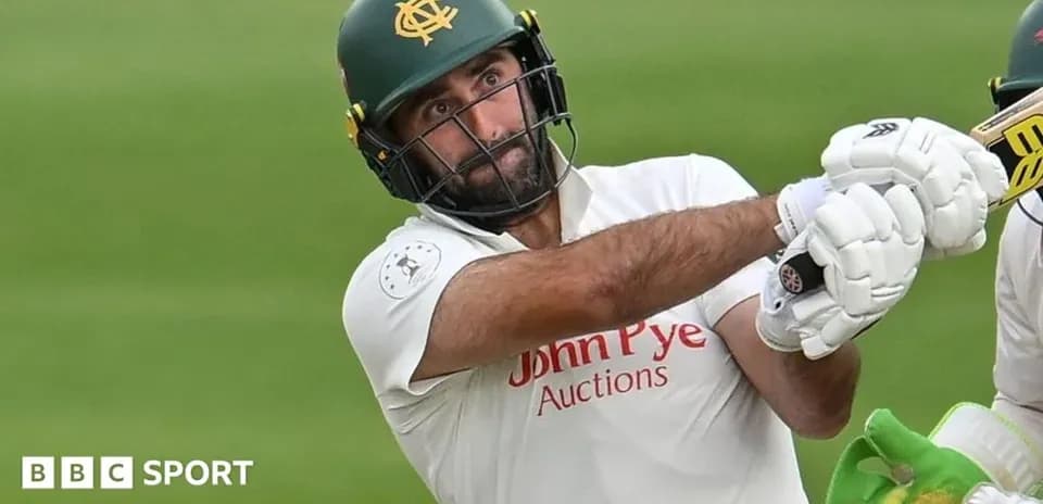 Batsman hitting a shot during cricket match