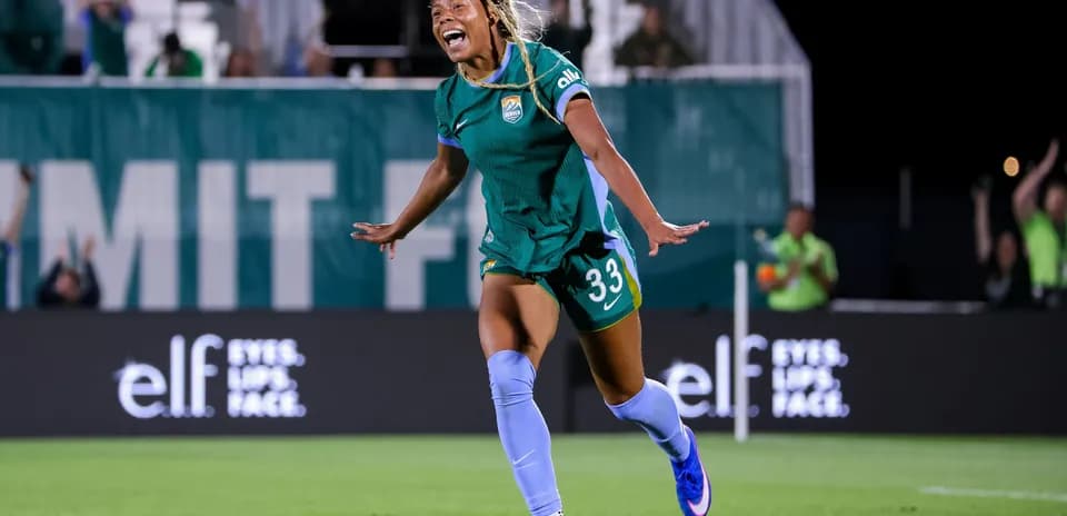 Player celebrating a goal during a soccer match