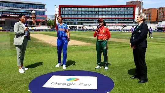 Captains and officials at cricket toss ceremony