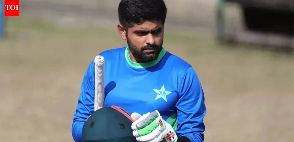 Batsman in blue kit preparing for training session