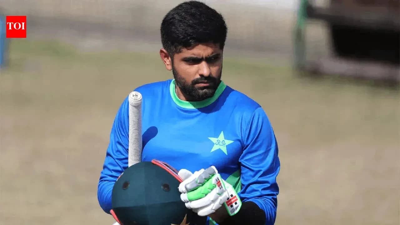 Batsman in blue kit preparing for training session