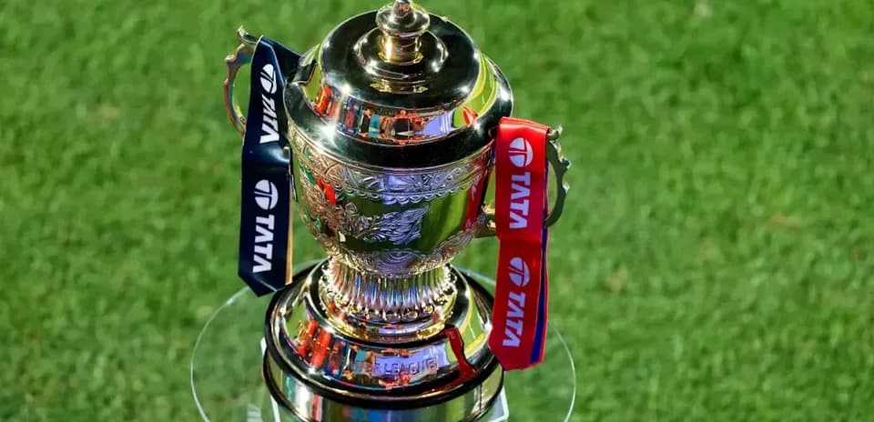 Trophy displayed on a pedestal on grass