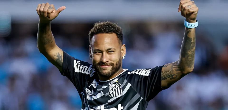 Player celebrating with thumbs up after match