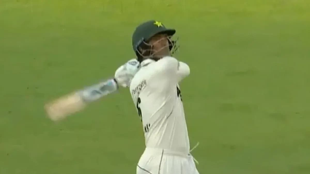 Batsman playing a shot during cricket match