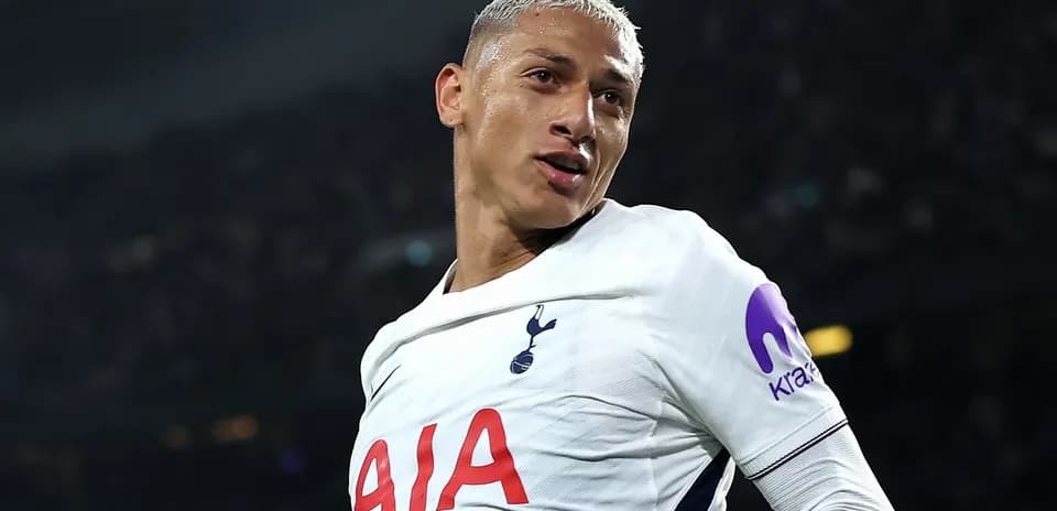 Player celebrating goal in Tottenham kit