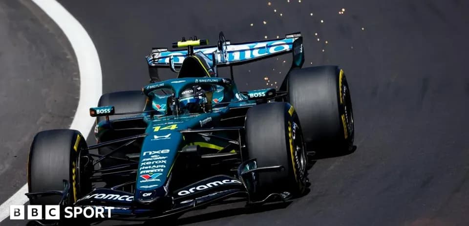 Formula 1 car driving on track with sparks