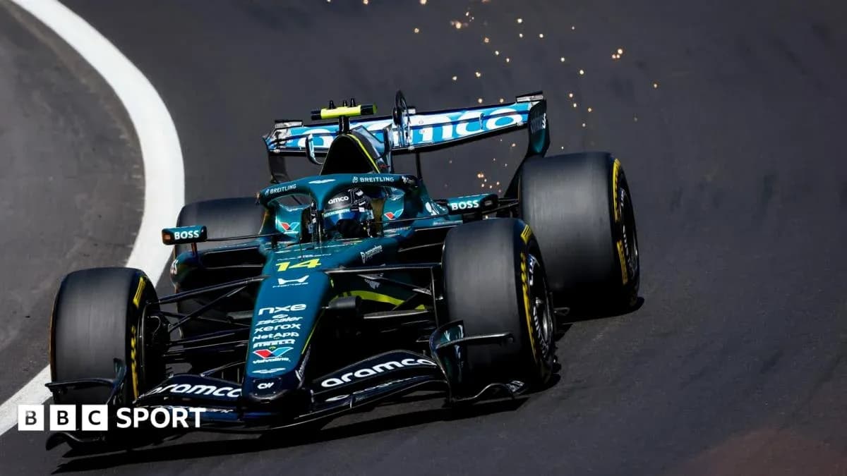 Formula 1 car driving on track with sparks