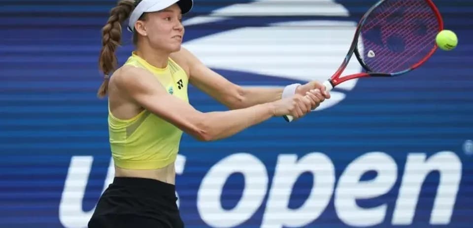 Player hitting a tennis ball at the US Open