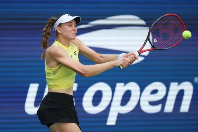 Player hitting a tennis ball at the US Open