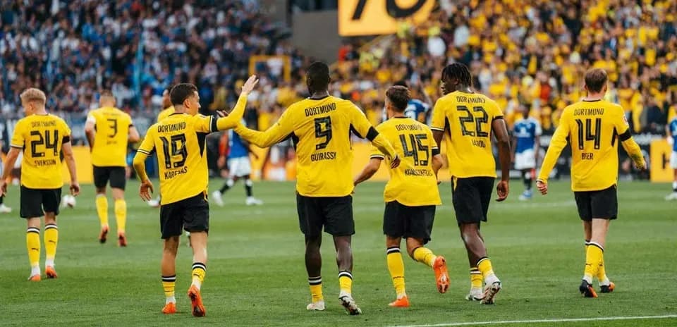 Borussia Dortmund players celebrating during a match