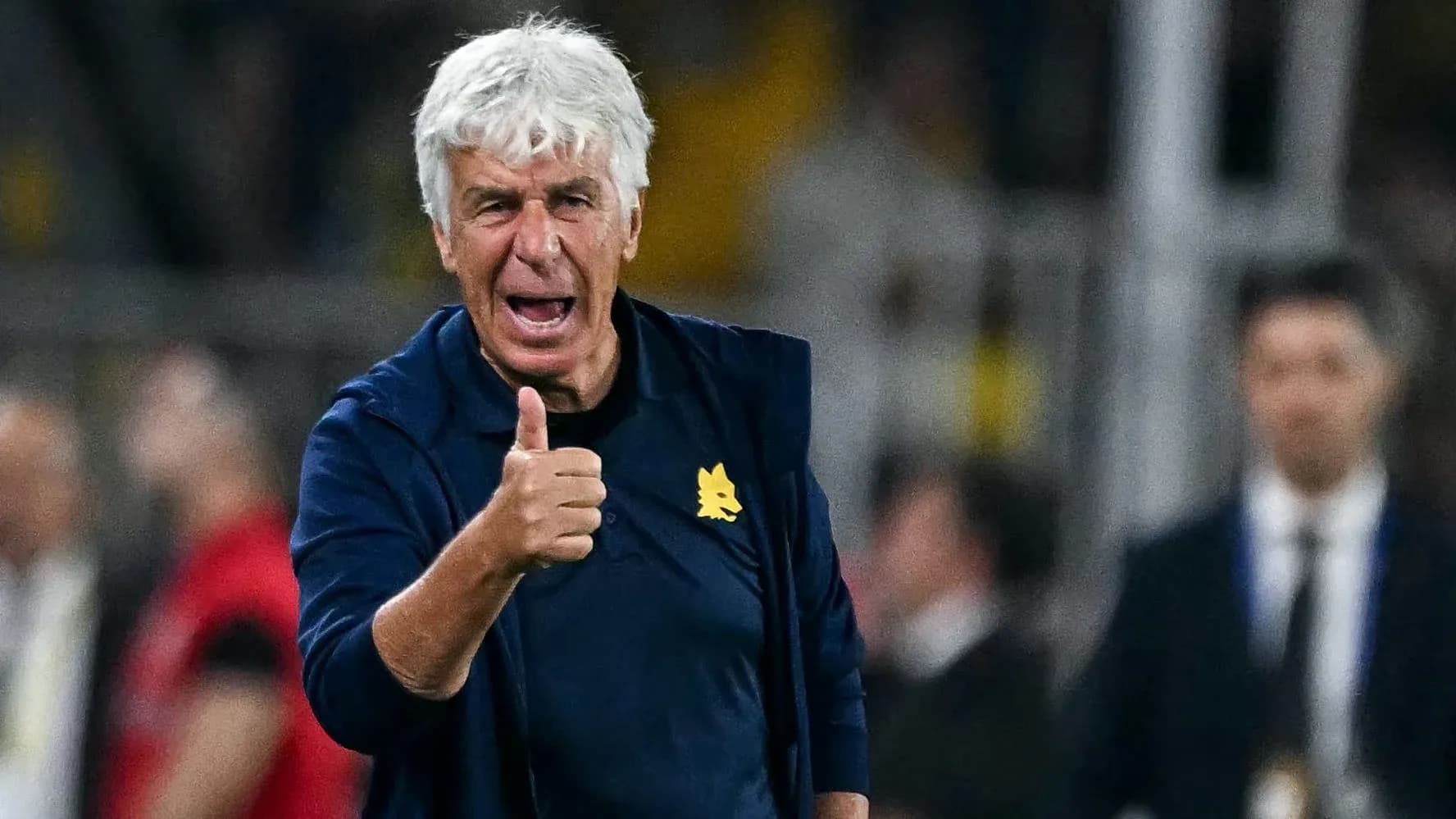 Coach giving thumbs up during a match