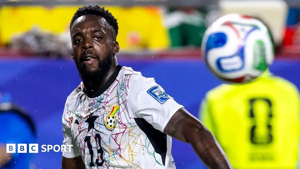 Ghanaian player preparing to play the ball