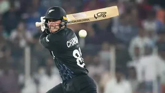 Batter playing a shot during cricket match