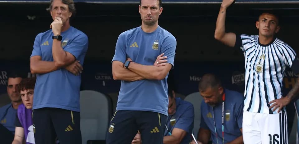Coaches and players on Argentina's bench during match