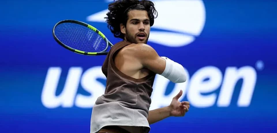 Player hitting a forehand shot at US Open