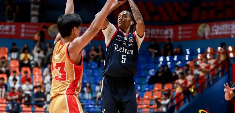 Player shooting basketball during a game action