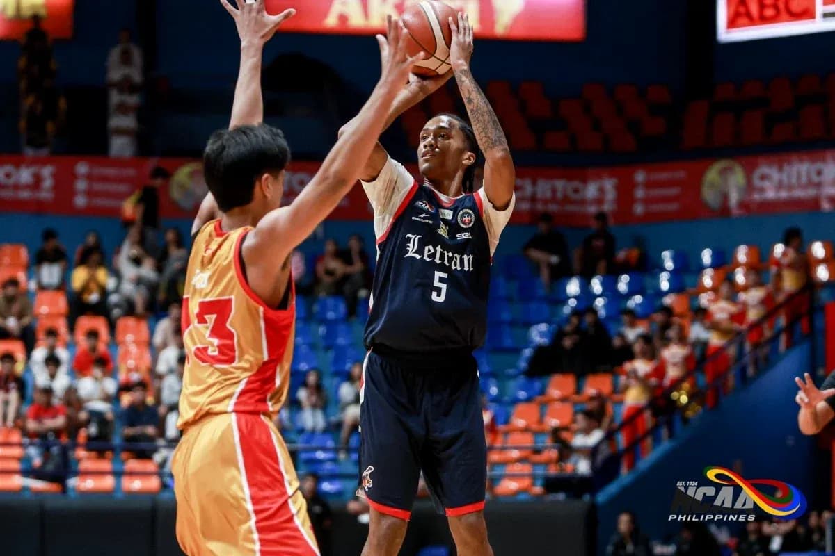 Player shooting basketball during a game action