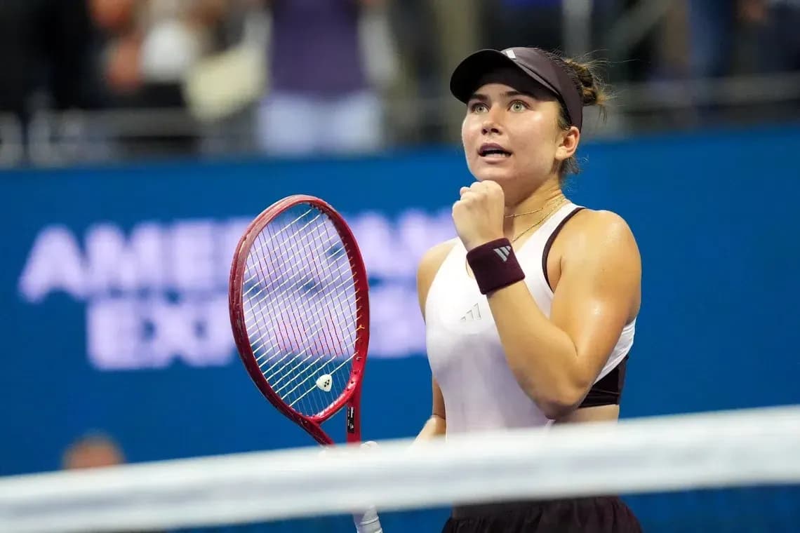 Tennis player celebrating a point during match