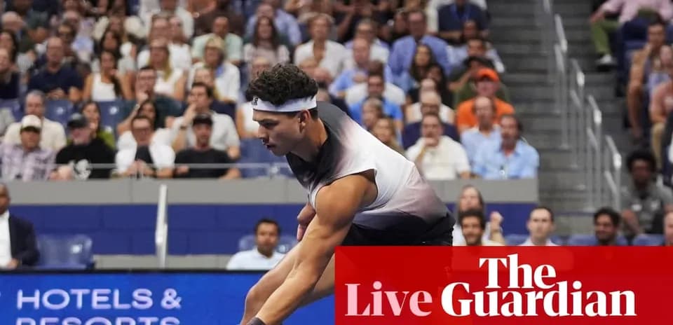 Tennis player serving during a match at stadium
