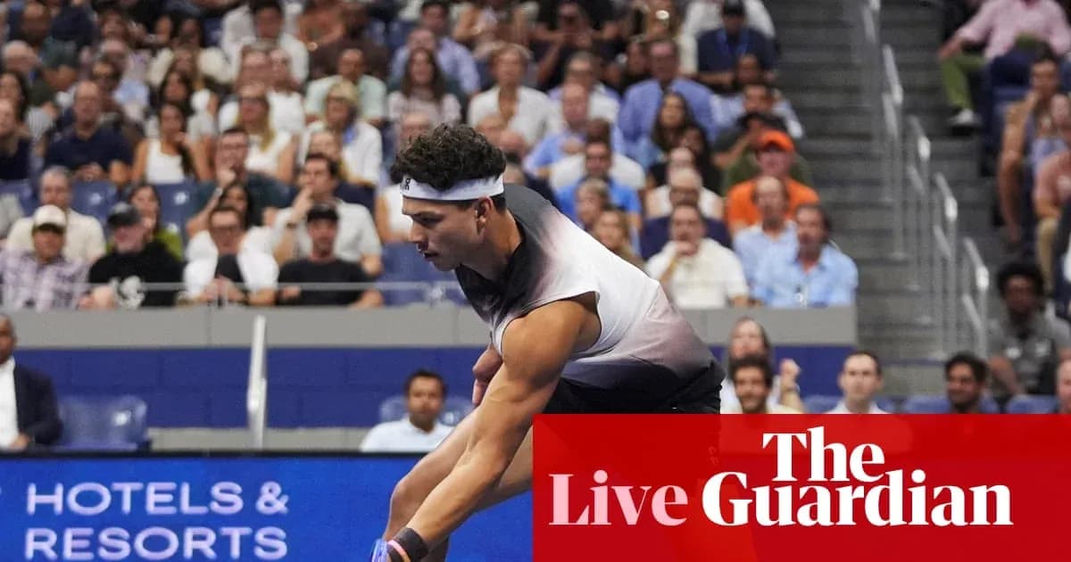 Tennis player serving during a match at stadium