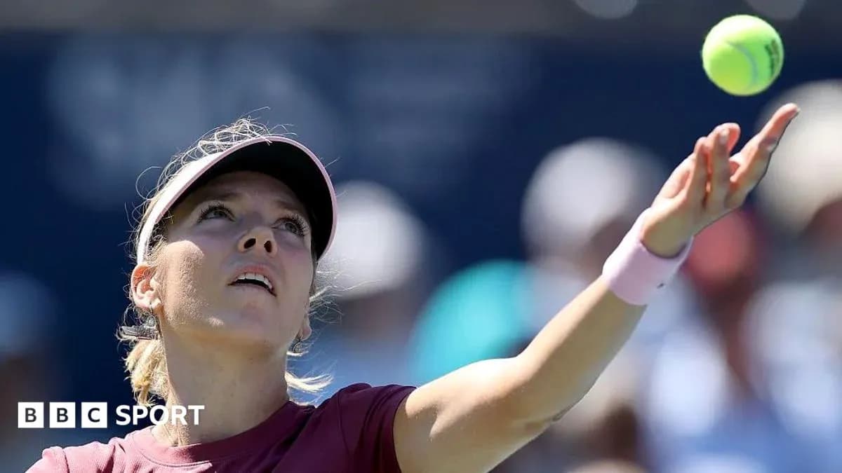 Player serving tennis ball during match