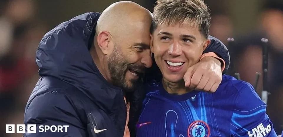 Coach celebrating with player after match